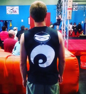 Wieboldt sports a custom made EVO Rock + Fitness shirt for the comp 